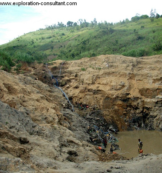 Constant dewatering of the pit is necessary, not too seldom the walls collapse and bury the gold miners.
