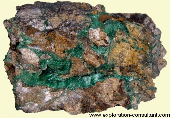 Ruashi Mine: typical Cu-Co ore with malachite and heterogenite (black crusts on top left of sample).